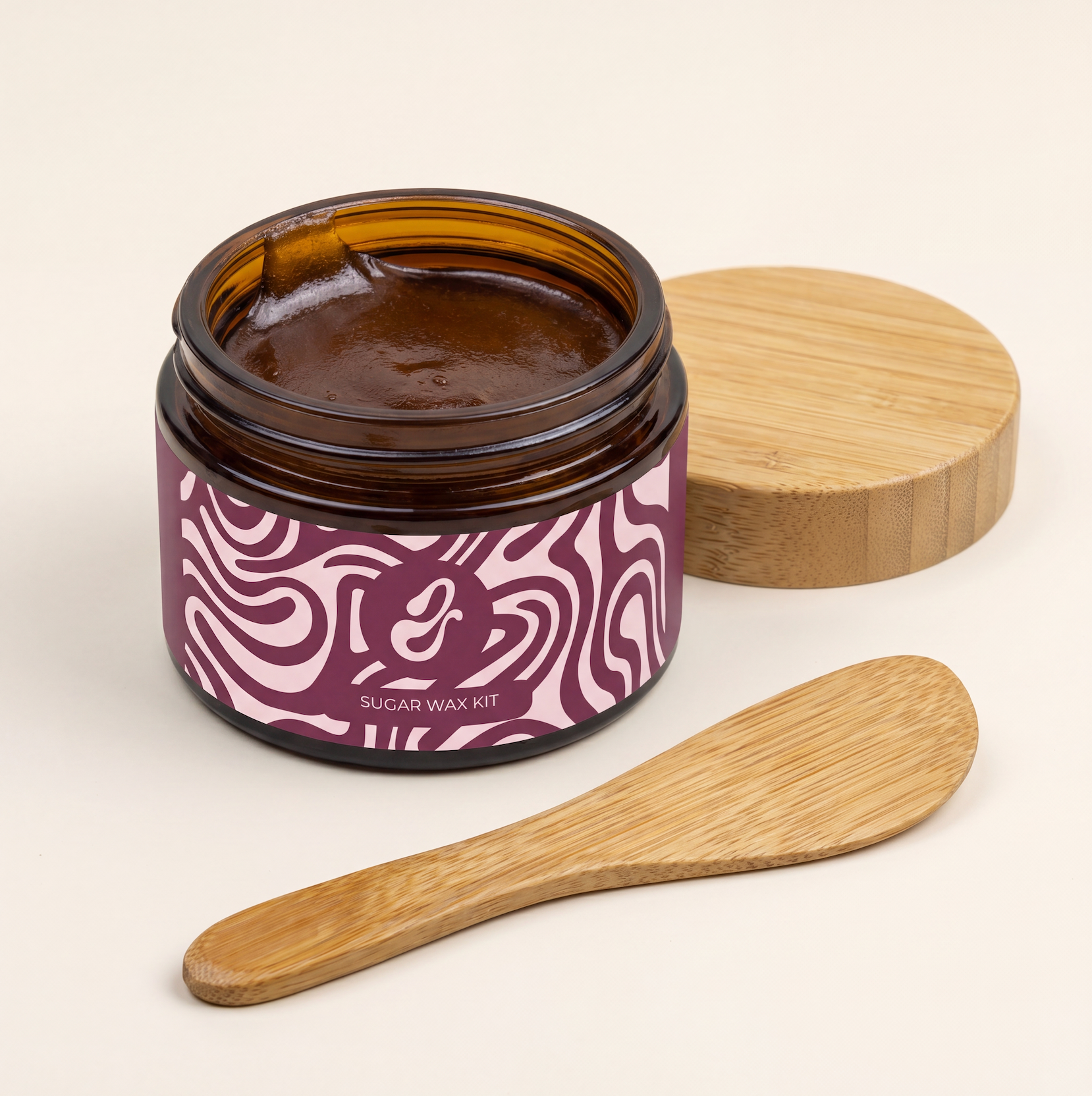 Sugar wax applied to leg with bamboo spatula