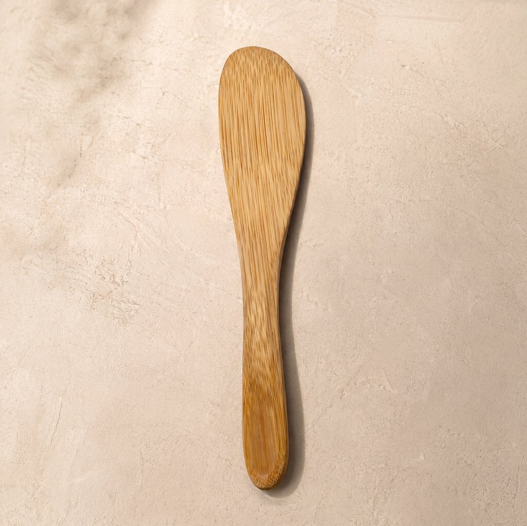 Sugar wax removal step with bamboo spatula